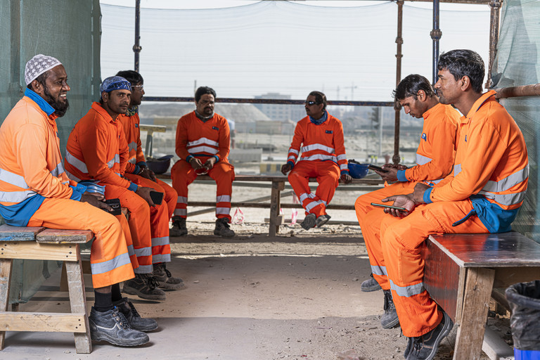 Workers at a rest area of Ras Abu Aboud Stadium – FIFA World Cup Qatar 2022™ construction site